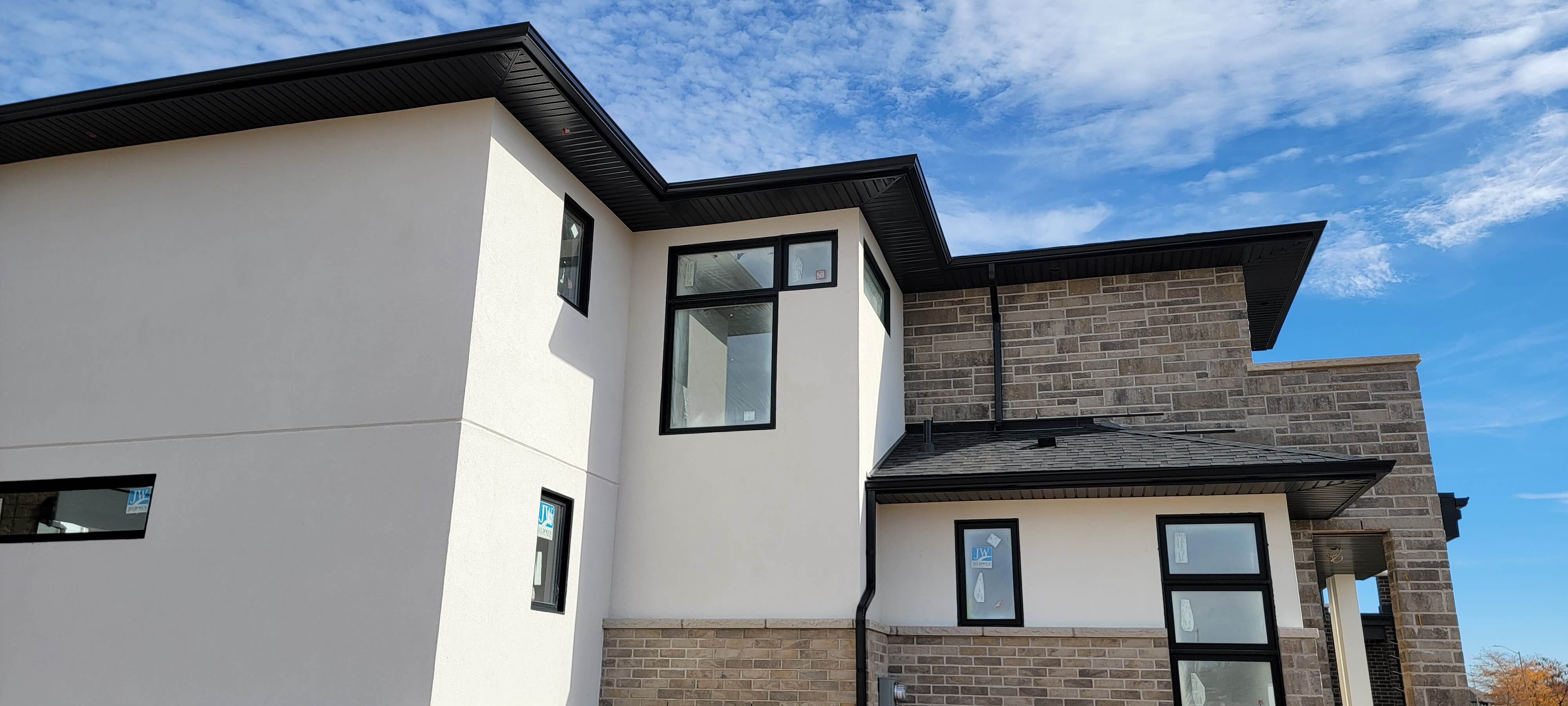 Stucco painting and recoating on a Sarasota County home